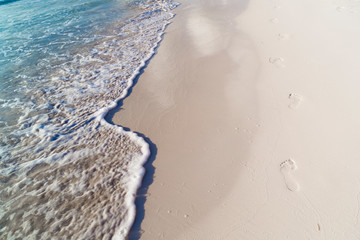 Fototapeta na wymiar Footprints on the beach of the Mayan Riviera in Tulum, Quintana Roo, Mexico