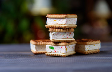 Cookies with marshmallows and marmalade on a wooden table. Fresh homemade pastries.