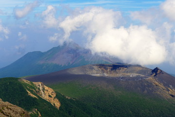 Shinmoe-dake and Takachiho-no-mine volcano ridge seen from Karakuni-dake, Ebino kogen, Japan