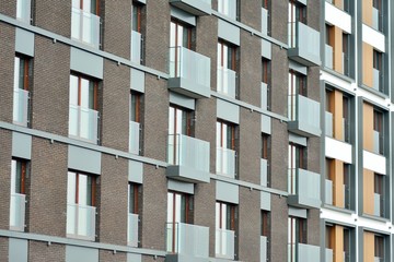 Fragment of a modern apartment building in front. Very modern apartment house.