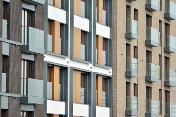 Fragment of a modern apartment building in front. Very modern apartment house.