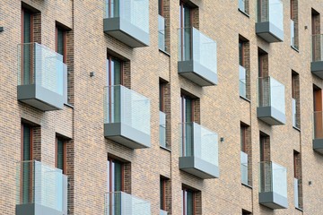 Fragment of a modern apartment building in front. Very modern apartment house.