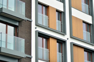 Fragment of a modern apartment building in front. Very modern apartment house.