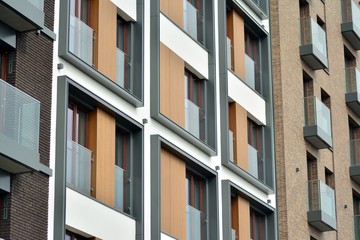 Fragment of a modern apartment building in front. Very modern apartment house.