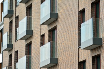 Fragment of a modern apartment building in front. Very modern apartment house.