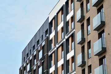 Fragment of a modern apartment building in front. Very modern apartment house.
