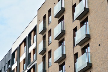 Fragment of a modern apartment building in front. Very modern apartment house.