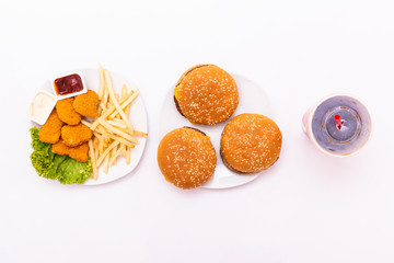Concept of mock up burger, french fries and fried chicken and soda set isolated on white background.