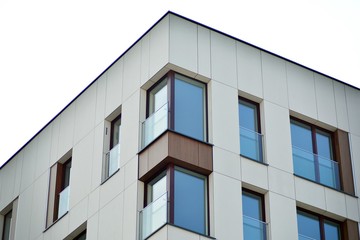 Fragment of a modern apartment building in front. Very modern apartment house.
