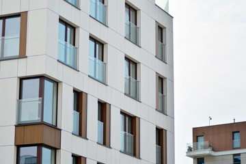 Fragment of a modern apartment building in front. Very modern apartment house.