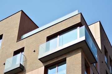 Fragment of a modern apartment building in front. Very modern apartment house.