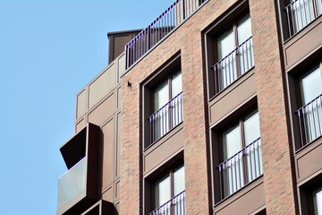 Fragment of a modern apartment building in front. Very modern apartment house.