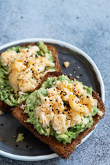 Toast with mashed avocado and scramble egg