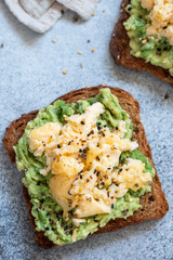 Toast with mashed avocado and scramble egg