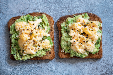 Toast with mashed avocado and scramble egg