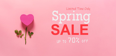 Spring sale message with heart flower top view flat lay