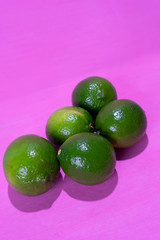 Set of limes on colorful background