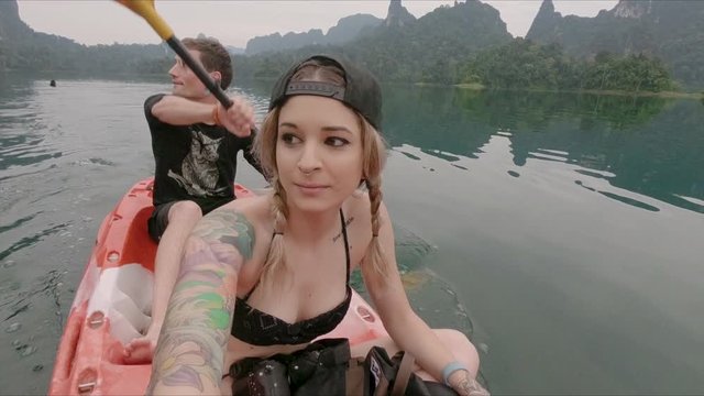 Young Couple Traveling Kayak In Thailand Cheow Lan Lake Khao Sok