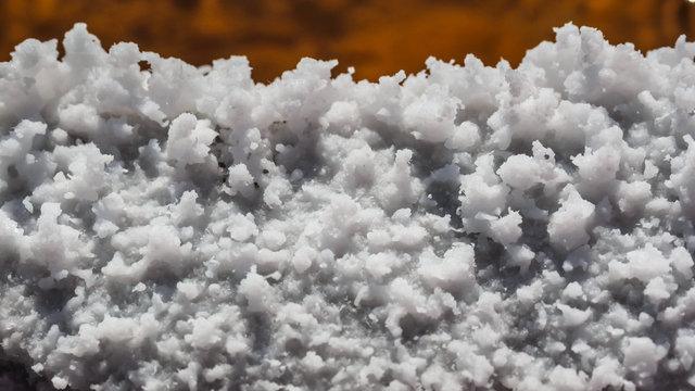 Close up salt pic in Salinas de A&ntilde;ana. Production of salt in an ancient artisan way in the Basque Country