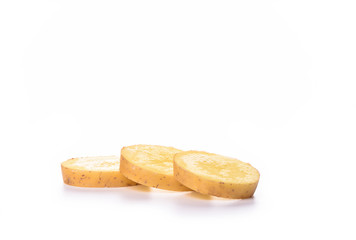 Potato cut slices isolated on white background. Copy space