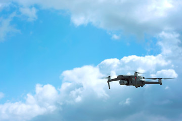 Drone quadcopter with digital camera in the sky - Photo