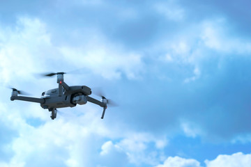 Drone quadcopter with digital camera in the sky - Photo