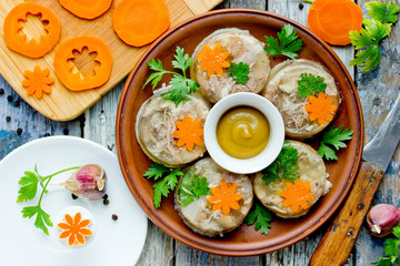 Aspic meat jelly kholodets with carrot and parsley