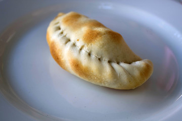 Empanada in a white plate