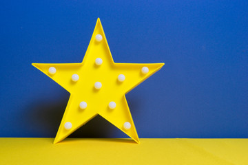 beautiful star shaped toy on the wonderful blue background