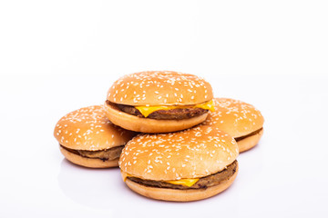 Four burgers isolated on white background