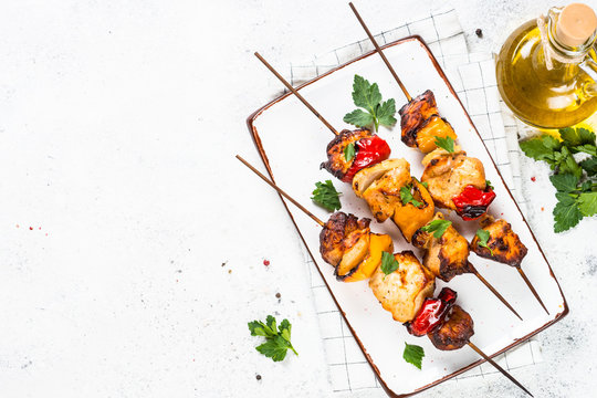 Chicken Kebab On Skewers On White.