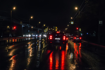 Car traffic at night on the avenue