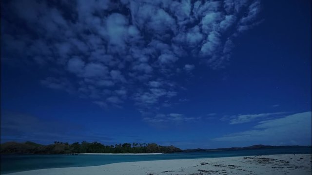 Night time lapse of clouds motion on the sky.