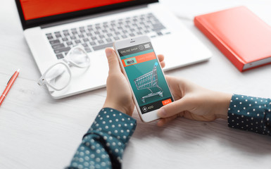 Man holds a tablet and looks at the screen. Mobile development. Innovational online businesses. Internet technologies. Trendy design. Geometry. Fashionable vibrant colors. Using a device. UX and UI.