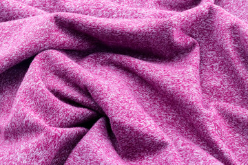 Fototapeta na wymiar Background of twisted and crumpled fabric purple or burgundy