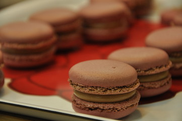 colorful macaroons on wooden table