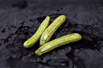 Fresh green wet zucchini.