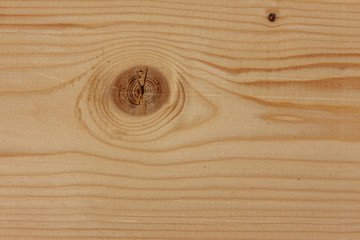 Fototapeta premium pine wooden textured background with big knot
