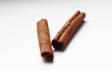 cinnamon sticks on white background