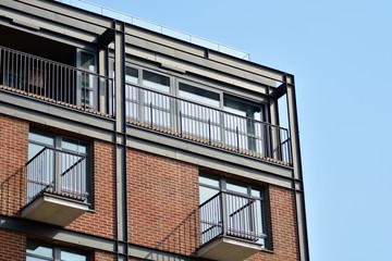 Fragment of a modern apartment building in front. Very modern apartment house.
