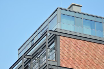 Fragment of a modern apartment building in front. Very modern apartment house.