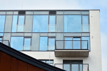 Fragment of a modern apartment building in front. Very modern apartment house.