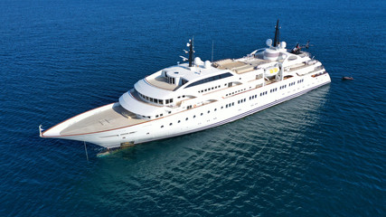 Fototapeta na wymiar Aerial drone photo of luxury mega yacht docked in tropical open ocean sea
