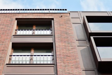 Fragment of a modern apartment building in front. Very modern apartment house.