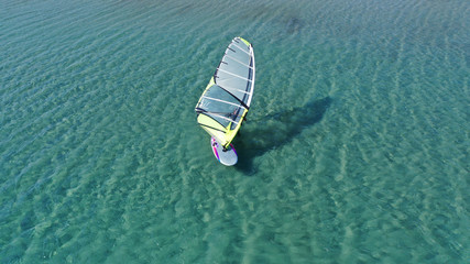 Aerial drone photo of Wind surfer practising in tropical exotic open ocean destination