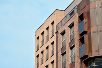 Fragment of a modern apartment building in front. Very modern apartment house.