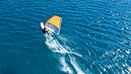 Aerial drone photo of Wind surfer practising in tropical exotic open ocean destination