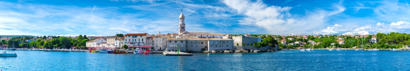 Fototapeta na wymiar Wonderful romantic summer in old town at Adriatic sea. Summer panoramic coastline landscape. Boats and yachts in harbor. Krk. Krk island. Croatia. Europe.