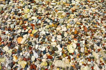 Colorful pebbles in the sea for backgrounds