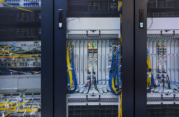 Inside cabinet with switchboard and other telecommunication mobile network hardware equipment with...